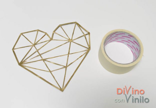 corazón geométrico con vinilo dorado